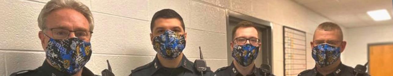 Police officers wearing masks due to Covid