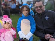 Clerk with Kids in Costume